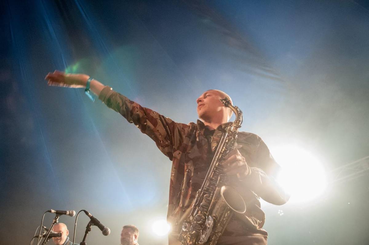 136997 Man holding saxophone